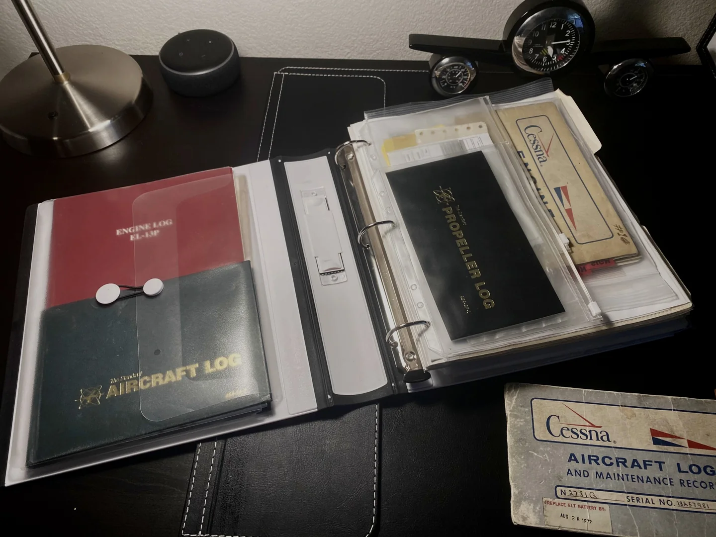 Aircraft logbooks on a cockpit seat, ready for a records review